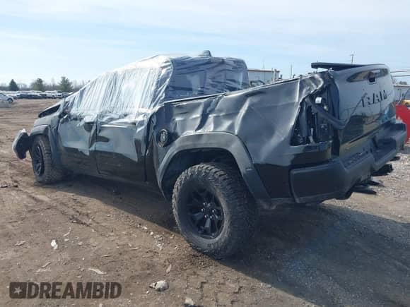 2024 Ram 1500 TRX with VIN 1C6SRFU95RN113699, listed as a IAAI auction lot 41554126 with 3,750 mi miles and . Bid and sale history available at DreamBid. Image 3.