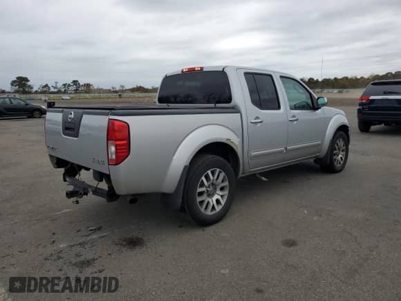 2011 Nissan Frontier Pro-4X z VIN 1N6AD0EVXBC416696, wystawiony jako Copart lot #90623765 z przebiegiem 161 124 mil mil oraz Szkoda całkowita • Salvage title. Historia ofert i sprzedaży dostępna na DreamBid. Obrazek 3.