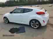 2014 Hyundai Veloster z VIN KMHTC6ADXEU187204, wystawiony jako Copart lot #71670725 z przebiegiem 94 917 mil mil oraz Czysty tytuł • Clean title. Historia ofert i sprzedaży dostępna na DreamBid. Obrazek 2.