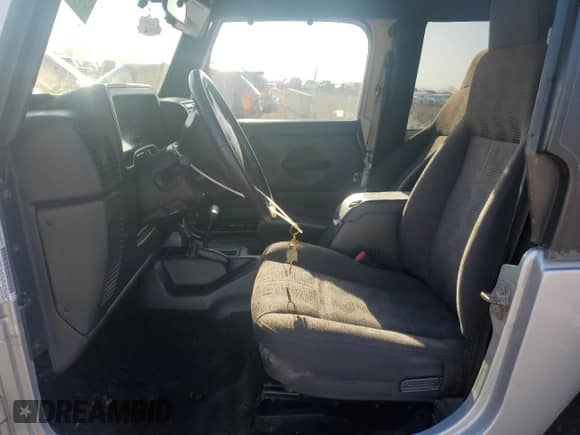 2003 Jeep Wrangler X z VIN 1J4FA39S63P356911, wystawiony jako Copart lot #81295295 z przebiegiem 92 861 mil mil oraz Szkoda całkowita • Salvage title. Historia ofert i sprzedaży dostępna na DreamBid. Obrazek 7.