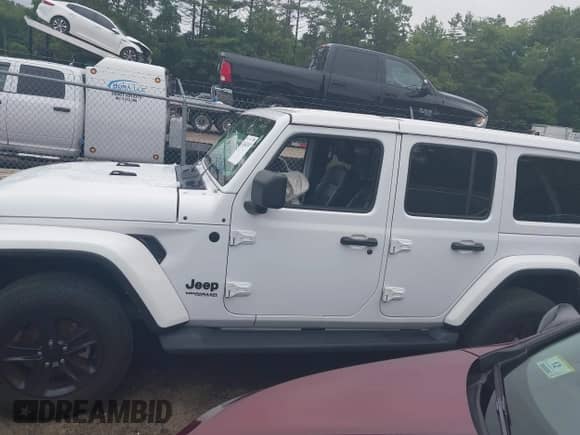 2022 Jeep Wrangler Unlimited Sahara Altitude with VIN 1C4HJXEG9NW232468, listed as a IAAI auction lot 42667697 with 40,881 mi miles and . Bid and sale history available at DreamBid. Image 15.