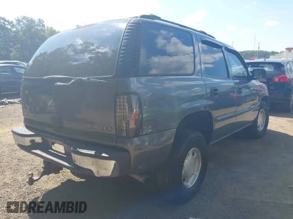 2001 Chevrolet Tahoe LS with VIN 1GNEC13T01R137713, listed as a IAAI auction lot 43080936 with 307,843 mi miles and . Bid and sale history available at DreamBid. Image 4.