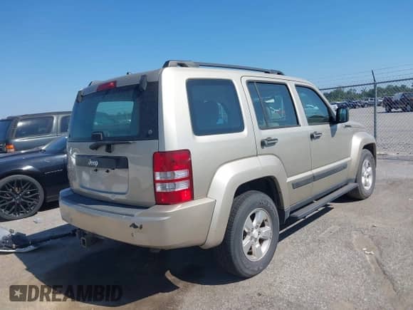 2011 Jeep Liberty Sport with VIN 1J4PN2GK5BW556964, listed as a IAAI auction lot 43404384 with 43,980 mi miles and . Bid and sale history available at DreamBid. Image 4.