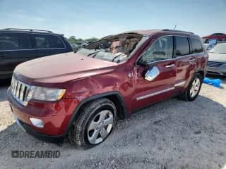 2012 Jeep Grand Cherokee Overland z VIN 1C4RJFCT4CC112879, wystawiony jako Copart lot #80381625 z przebiegiem Nie podano mil oraz Szkoda całkowita • Salvage title. Historia ofert i sprzedaży dostępna na DreamBid. Obrazek 1.
