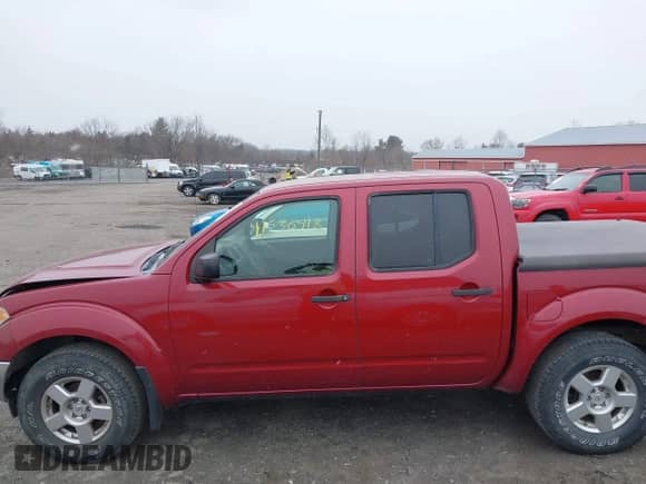 2007 Nissan Frontier LE with VIN 1N6AD07W27C456641, listed as a IAAI auction lot 41530418 with 94,792 mi miles and . Bid and sale history available at DreamBid. Image 14.