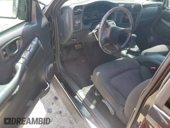 2005 Chevrolet Blazer z VIN 1GNCS18X35K106637, wystawiony jako Copart lot #55998405 z przebiegiem 197 709 mil mil oraz Szkoda całkowita • Salvage title. Historia ofert i sprzedaży dostępna na DreamBid. Obrazek 8.