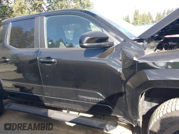 2024 Toyota Tacoma SR5 with VIN 3TMLB5JN4RM080833, listed as a IAAI auction lot 43404104 with 19,266 mi miles and . Bid and sale history available at DreamBid. Image 14.