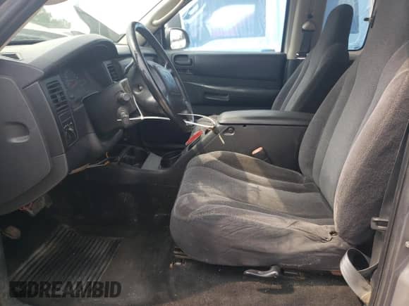 2003 Dodge Dakota с VIN 1D7HG12X13S196592, выставлен на аукционе Copart как лот 58576995 с пробегом 22 818 миль миль и Списание • Salvage title. История ставок и продаж доступна на DreamBid. Изображение 7.