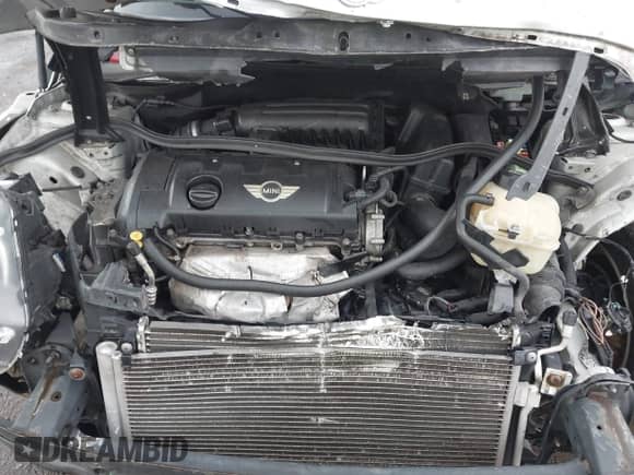 2012 MINI Hardtop z VIN WMWSU3C56CT539812, wystawiony jako IAAI lot #43268307 z przebiegiem 108 198 mil mil oraz . Historia ofert i sprzedaży dostępna na DreamBid. Obrazek 10.