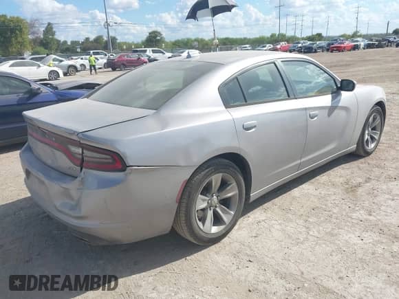2016 Dodge Charger SXT with VIN 2C3CDXHG0GH196057, listed as a IAAI auction lot 43270915 with 244,696 mi miles and . Bid and sale history available at DreamBid. Image 4.