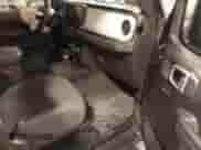 2024 Jeep Wrangler Sport S with VIN 1C4PJXDG4RW218996, listed as a IAAI auction lot 42088856 with 10,717 mi miles and . Bid and sale history available at DreamBid. Image 5.