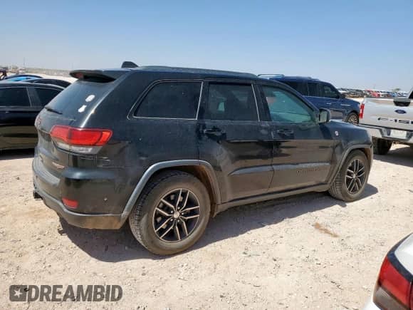 2017 Jeep Grand Cherokee Trailhawk with VIN 1C4RJFLTXHC962121, listed as a Copart auction lot 61807275 with 145,464 mi miles and Clean title. Bid and sale history available at DreamBid. Image 3.