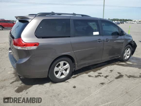 2014 Toyota Sienna LE AAS with VIN 5TDKK3DCXES437212, listed as a Copart auction lot 70334955 with 267,885 mi miles and Salvage title. Bid and sale history available at DreamBid. Image 3.
