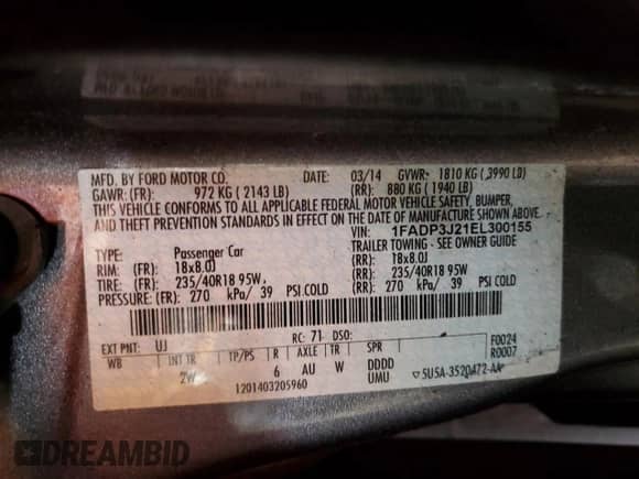 2014 Ford Focus Titanium z VIN 1FADP3J21EL300155, wystawiony jako Copart lot #86535845 z przebiegiem 100 737 mil mil oraz Czysty tytuł • Clean title. Historia ofert i sprzedaży dostępna na DreamBid. Obrazek 12.