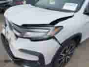 2021 Honda Pilot Elite with VIN 5FNYF6H04MB079091, listed as a IAAI auction lot 42739979 with 62,723 mi miles and . Bid and sale history available at DreamBid. Image 19.