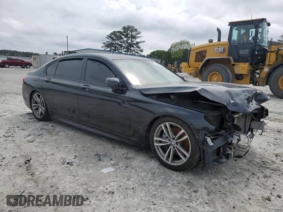 2019 BMW 7 Series 740i xDrive with VIN WBA7E4C51KGV28443, listed as a Copart auction lot 54751395 with Not provided miles and Clean title. Bid and sale history available at DreamBid. Image 4.