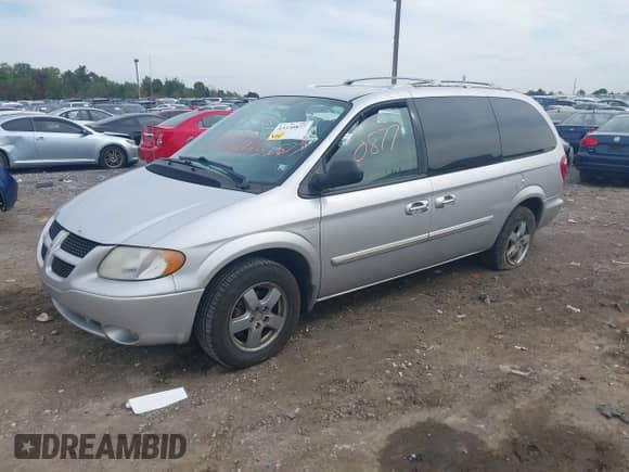 2004 Dodge Caravan SXT with VIN 2D4GP44L64R516111, listed as a IAAI auction lot 43330877 with 128,284 mi miles and . Bid and sale history available at DreamBid. Image 2.