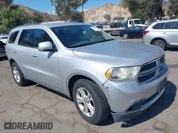 2011 Dodge Durango Crew z VIN 1D4RD4GG9BC633803, wystawiony jako IAAI lot #43295197 z przebiegiem 163 062 mil mil oraz . Historia ofert i sprzedaży dostępna na DreamBid. Obrazek 1.