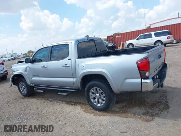2019 Toyota Tacoma SR5 with VIN 3TMAZ5CN9KM102668, listed as a IAAI auction lot 43060428 with 59,956 mi miles and . Bid and sale history available at DreamBid. Image 14.