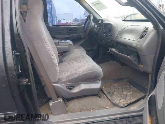 1999 Ford F-150 with VIN 1FTRX18W3XNC34874, listed as a IAAI auction lot 43532383 with 2,757,620 mi miles and . Bid and sale history available at DreamBid. Image 5.