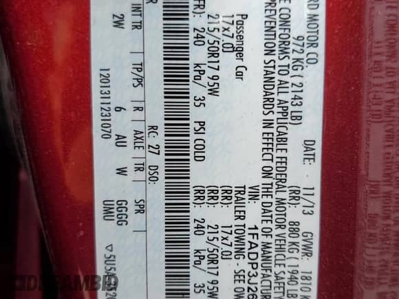 2014 Ford Focus Titanium with VIN 1FADP3J26EL227901, listed as a Copart auction lot 70023645 with 68,796 mi miles and Salvage title. Bid and sale history available at DreamBid. Image 12.