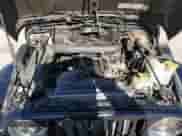 2000 Jeep Wrangler Sport with VIN 1J4FA49S1YP796600, listed as a Copart auction lot 82574545 with 128,340 mi miles and Clean title. Bid and sale history available at DreamBid. Image 12.