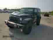 2015 Jeep Wrangler Rubicon Hard Rock z VIN 1C4BJWCG9FL714606, wystawiony jako Copart lot #68521014 z przebiegiem 35 187 mil mil oraz Szkoda całkowita • Salvage title. Historia ofert i sprzedaży dostępna na DreamBid. Obrazek 11.