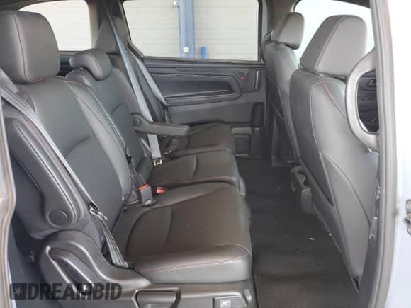 2023 Honda Odyssey Sport z VIN 5FNRL6H75PB051122, wystawiony jako Copart lot #64269675 z przebiegiem 17 588 mil mil oraz Szkoda całkowita • Salvage title. Historia ofert i sprzedaży dostępna na DreamBid. Obrazek 11.