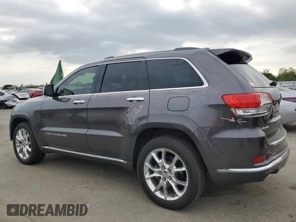 2015 Jeep Grand Cherokee Summit with VIN 1C4RJFJT7FC674427, listed as a Copart auction lot 84535555 with 93,576 mi miles and Salvage title. Bid and sale history available at DreamBid. Image 2.