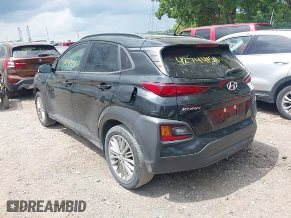 2021 Hyundai Kona SEL with VIN KM8K22AA1MU694195, listed as a IAAI auction lot 42744155 with 110,878 mi miles and . Bid and sale history available at DreamBid. Image 3.