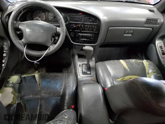 1992 Toyota Camry с VIN JT2VK13E1N0104283, выставлен на аукционе Copart как лот 84410054 с пробегом 317 177 миль миль и Списание • Salvage title. История ставок и продаж доступна на DreamBid. Изображение 8.