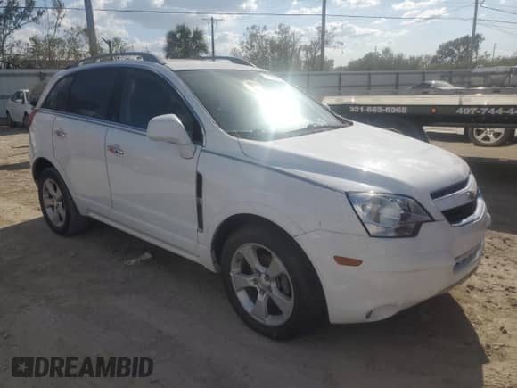 2014 Chevrolet Captiva Sport LTZ с VIN 3GNAL4EK2ES554953, выставлен на аукционе Copart как лот 77829244 с пробегом Не указан миль и Списание • Salvage title. История ставок и продаж доступна на DreamBid. Изображение 4.