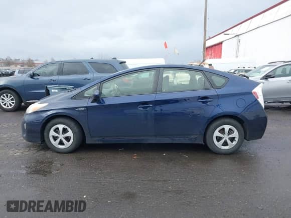 2013 Toyota Prius One with VIN JTDKN3DU5D1696220, listed as a IAAI auction lot 41656428 with 238,910 mi miles and . Bid and sale history available at DreamBid. Image 14.