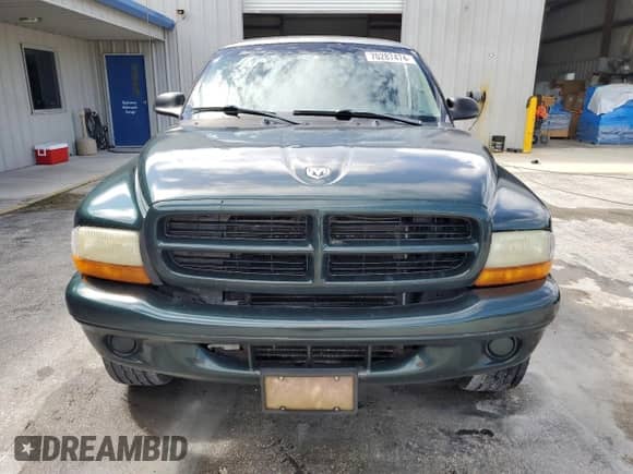 2002 Dodge Dakota с VIN 1B7GG12X32S604952, выставлен на аукционе Copart как лот 70287474 с пробегом 261 050 миль миль и На запчасти • Non repairable. История ставок и продаж доступна на DreamBid. Изображение 5.