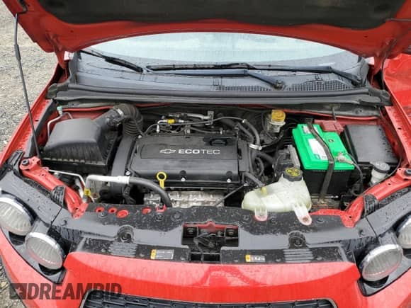 2012 Chevrolet Sonic LS with VIN 1G1JB6SH6C4120122, listed as a Copart auction lot 61784985 with 160,048 mi miles and Salvage title. Bid and sale history available at DreamBid. Image 12.