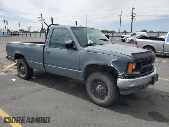 1994 Chevrolet Silverado 2500 с VIN 1GCFK24K5RZ275125, выставлен на аукционе Copart как лот 61460855 с пробегом 238 068 миль миль и Списание • Salvage title. История ставок и продаж доступна на DreamBid. Изображение 4.