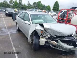 2004 Toyota Camry LE with VIN 4T1BF32K24U070150, listed as a IAAI auction lot 42390540 with 380,768 mi miles and . Bid and sale history available at DreamBid. Image 1.