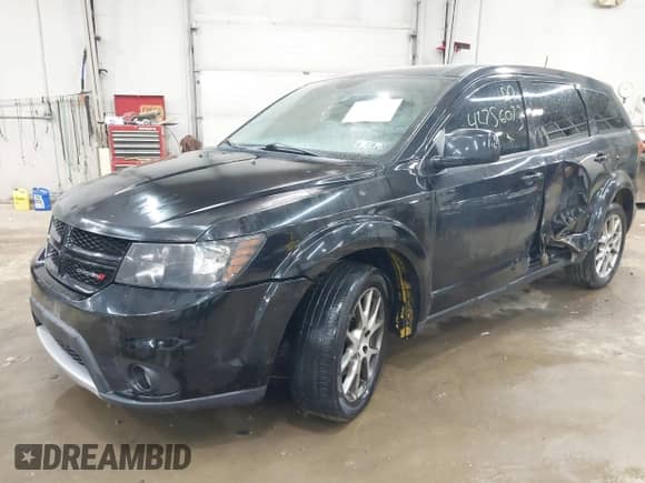 2014 Dodge Journey R/T with VIN 3C4PDDEGXET309453, listed as a IAAI auction lot 42756073 with 158,481 mi miles and . Bid and sale history available at DreamBid. Image 2.