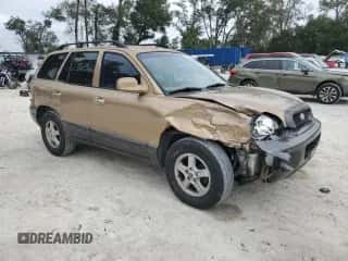2001 Hyundai Santa Fe GLS с VIN KM8SC83D61U039954, выставлен на аукционе Copart как лот 86175224 с пробегом 378 265 миль миль и Списание • Salvage title. История ставок и продаж доступна на DreamBid. Изображение 4.