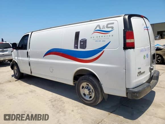 2015 Chevrolet Express Cargo with VIN 1GCWGGCF0F1164320, listed as a Copart auction lot 61208105 with 276,014 mi miles and Salvage title. Bid and sale history available at DreamBid. Image 2.