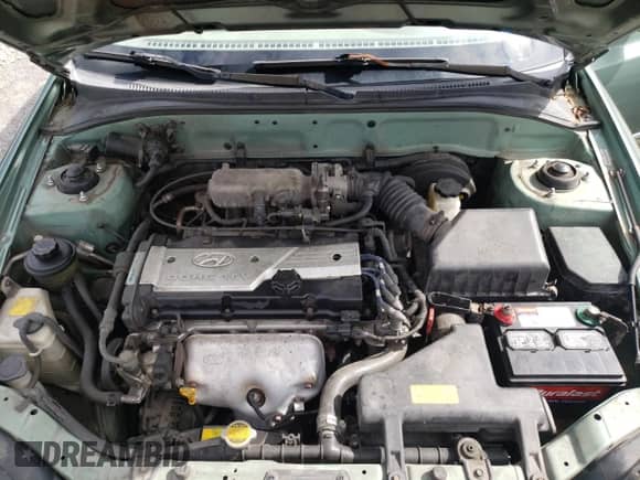 2005 Hyundai Accent GLS с VIN KMHCG35C05U325871, выставлен на аукционе Copart как лот 64258985 с пробегом 166 574 миль миль и Списание • Salvage title. История ставок и продаж доступна на DreamBid. Изображение 11.