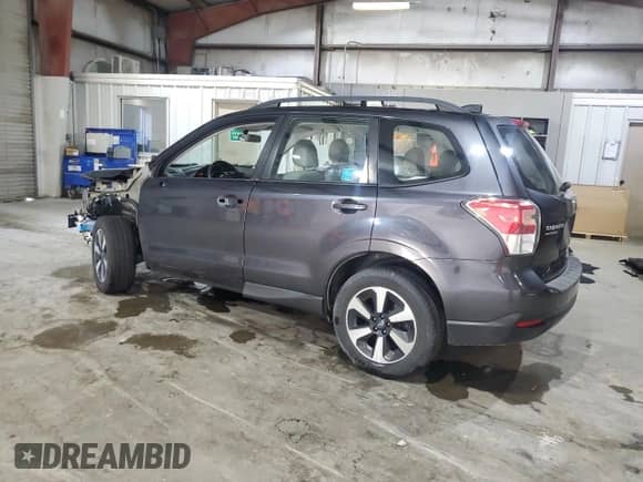 2017 Subaru Forester with VIN JF2SJABCXHH515332, listed as a Copart auction lot 85301185 with 112,823 mi miles and Salvage title. Bid and sale history available at DreamBid. Image 2.