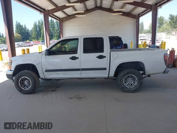 2007 Chevrolet Colorado 2LT z VIN 1GCCS13E478105348, wystawiony jako IAAI lot #42820005 z przebiegiem 157 641 mil mil oraz . Historia ofert i sprzedaży dostępna na DreamBid. Obrazek 15.