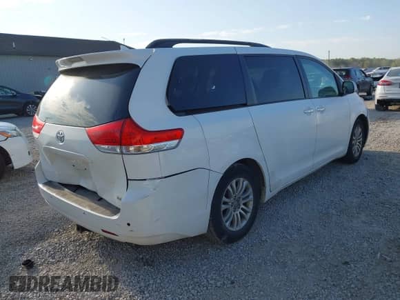 2011 Toyota Sienna XLE AAS with VIN 5TDYK3DC4BS030573, listed as a IAAI auction lot 43196976 with 290,800 mi miles and . Bid and sale history available at DreamBid. Image 4.