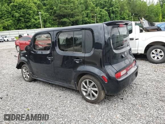 2011 Nissan Cube S Krom Edition с VIN JN8AZ2KR7BT211221, выставлен на аукционе Copart как лот 60298475 с пробегом 121 135 миль миль и Списание • Salvage title. История ставок и продаж доступна на DreamBid. Изображение 2.