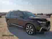 2023 Honda Pilot Elite with VIN 5FNYG1H84PB012565, listed as a Copart auction lot 85123815 with 71,170 mi miles and Salvage title. Bid and sale history available at DreamBid. Image 4.