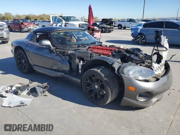 2002 Dodge Viper RT/10 with VIN 1B3ER65E02V102232, listed as a Copart auction lot 84650754 with 16,100 mi miles and Salvage title. Bid and sale history available at DreamBid. Image 4.