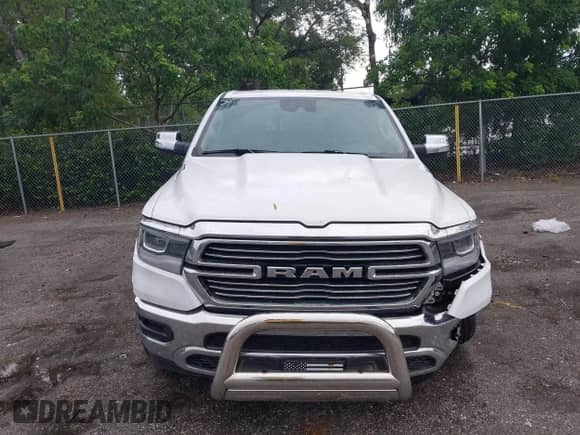 2021 Ram 1500 Laramie with VIN 1C6RREJT5MN628655, listed as a IAAI auction lot 42734346 with 104,116 mi miles and . Bid and sale history available at DreamBid. Image 12.