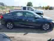 2016 Honda Civic LX with VIN 19XFC2F56GE246942, listed as a IAAI auction lot 43050802 with 99,087 mi miles and . Bid and sale history available at DreamBid. Image 13.