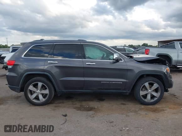 2016 Jeep Grand Cherokee Limited z VIN 1C4RJEBGXGC329874, wystawiony jako IAAI lot #43295520 z przebiegiem 135 086 mil mil oraz . Historia ofert i sprzedaży dostępna na DreamBid. Obrazek 13.